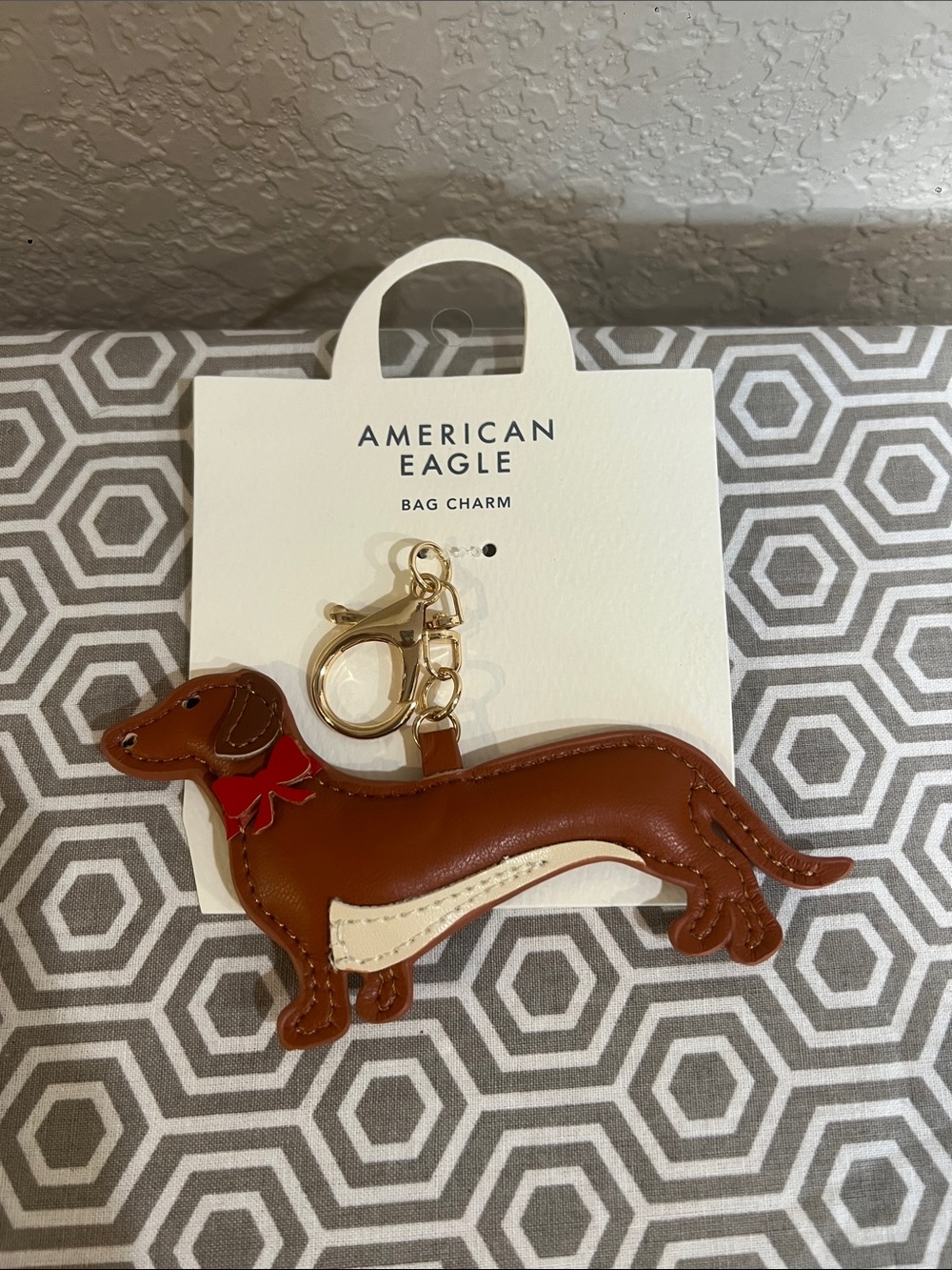 American Eagle Outfitters Brown & Cream Dachshund Bag Charm with Red Bow